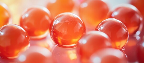 Poster - Close-up view of amber colored transparent spheres with reflections on a blurred background with copy space