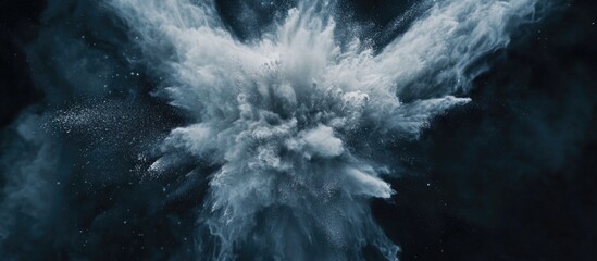 Wall Mural - Abstract explosion of smoke or powder on a dark background creating dynamic and textured visual with copy space for text