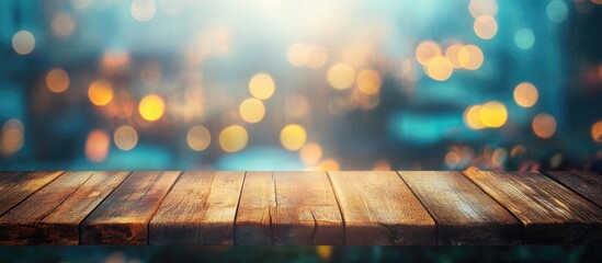 Poster - Wooden table with blurred bokeh light background and blue tones for product display and presentation with copy space.