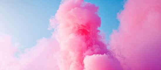 Poster - Vibrant Pink Smoke Cloud Against Blue Sky with Copy Space