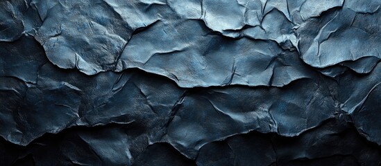 Poster - Textured dark blue crumpled paper background with intricate folds and creases suitable for design projects Copy Space
