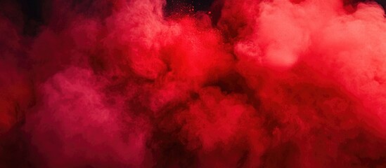 Poster - Red smoke or powder explosion on a dark background with vibrant hues and texture suitable for abstract designs Copy Space