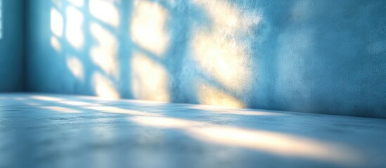 Poster - Empty room interior with textured blue walls and soft light reflections on the floor Copy Space