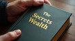 © Atralia13 - Book revealing knowledge strategies to grow wealth in a cozy home office environment close-up perspective