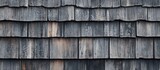 Wooden shingles texture in dark shades with irregular patterns suitable for backgrounds and design projects Copy Space