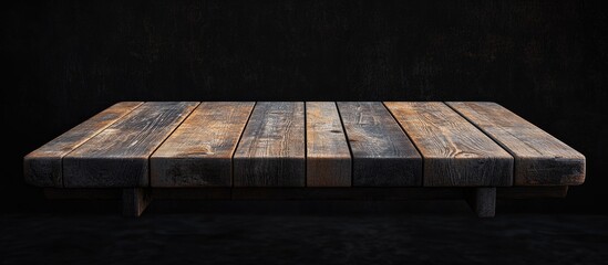 Poster - Wooden display table with rustic texture on a dark background ideal for product showcase with Copy Space
