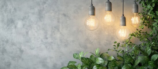 Poster - Hanging light bulbs with greenery on a textured wall providing natural decor and warm illumination with copy space for text placement
