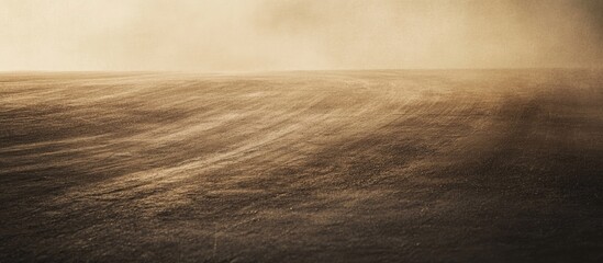 Poster - Dusty landscape with textured ground and horizon in warm tones, atmospheric perspective, suitable for backgrounds and creative projects, Copy Space