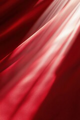 Poster - A deep red background features soft light rays radiating from one side, producing a sense of warmth and elegance while maintaining ample negative space for balance