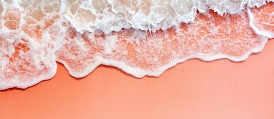 Aufkleber - Aerial view of coral colored beach with foamy waves and smooth sand texture, providing ample Copy Space for text placement