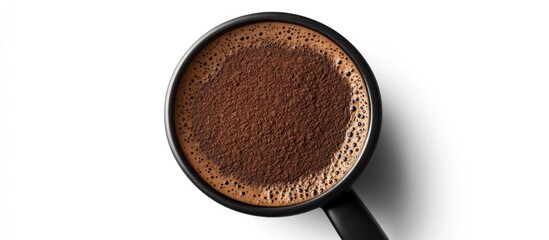 Poster - Top view of black mug filled with freshly brewed coffee and topped with ground coffee powder on white background Copy Space