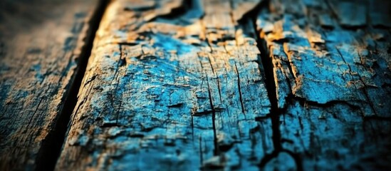 Poster - Textured wooden surface with blue and brown tones showing cracks and wear, ideal for background or design use, Copy Space