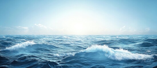 Poster - Ocean waves with bright blue sky and sunlight reflections over water, creating a tranquil seascape, Copy Space