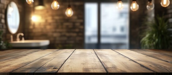 Poster - Wooden table top with blurred interior background featuring pendant lights and plants, suitable for product display and presentations, Copy Space