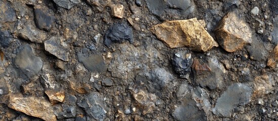 Poster - textured geological surface with varied rocks and gravel in shades of gray and brown suitable for ba
