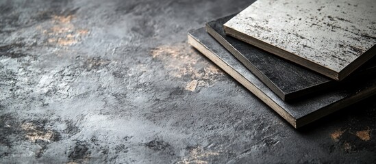 Poster - textured background with four stacked wooden panels in varying shades of gray and black with rustic finish and copy space on the left