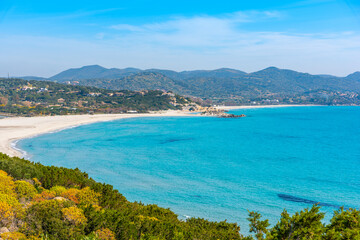 Wall Mural - Blue sky over a beach with white sand and turquoise water in Sardinia