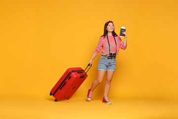 Sticker - Happy traveller with passport and suitcase on yellow background