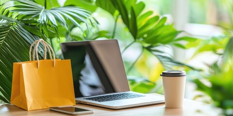 Leinwandbilder - A stylish home office with a computer, shopping bags, and a coffee cup, emphasizing the e-commerce lifestyle