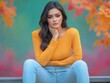 © Mohan - Woman sitting on park bench holding stomach in discomfort