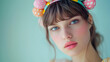 © Khalid - Woman in colorful Easter headband, close-up, solid background