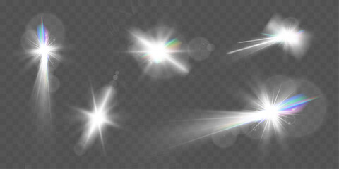 Wall Mural - set of glowing light effects with starbursts and radiating beams on a transparent background, ideal 