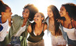 © peopleimages.com - Smile, hug and women with friends outdoors for summer vacation, freshman celebration and funny. Holiday, support and bonding with group of people in nature for social, adventure and connection