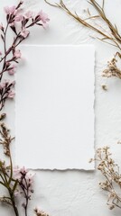 Leinwandbilder - Blank white paper surrounded by dried flowers on a textured surface in soft natural light. Generative AI