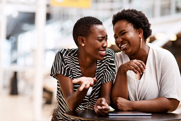 Poster - Women, friends and tablet at startup with laugh for funny meme, memory or share post on application. Black people, partner and happy together for comic video, break or social media at creative agency