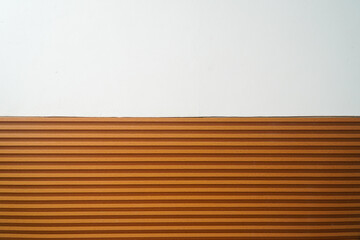 Poster - An image showcasing a minimalist design with a horizontal orange wood texture contrasted against a clean white background. Abstract Minimalist Orange and White Texture. Interior Design Architecture