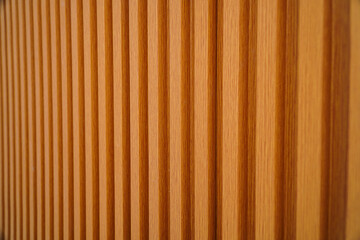 Poster - Close-up view of a wooden surface with vertical lines, showcasing the texture and detail of the wood. Striated Wooden Texture: A Detailed Close-Up of Vertical Wooden Slats