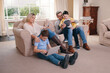 © peopleimages.com - Family, tech bonding and online in home, internet subscription and multiple membership on couch. Parents, children and media entertainment for boys in living room, love and website for streaming