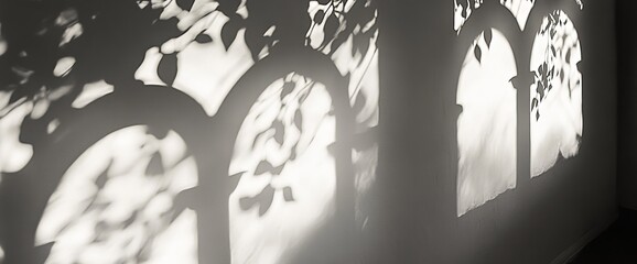 Poster - Light and shadow patterns projected on a wall, creating an artistic effect.