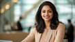 © PRASANNAPIX - young indian business woman sitting in the office