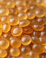 Poster - Golden translucent spheres in a close up view with soft light and shallow depth of field