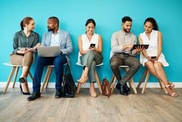 Poster - Business people, waiting room and job search with technology for career opportunity or interview at office. Group, employees or candidates with laptop or phone in row for company hiring or recruiting