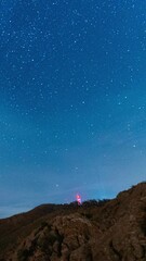 Wall Mural - starry sky above spain landscape, time lapse view
