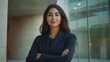 © Alexander Chaykin - Professional Businesswoman Standing Confidently