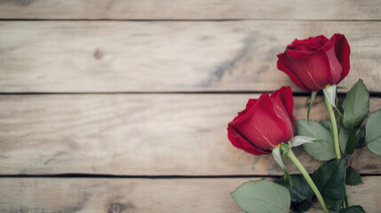 Wall Mural - Roses are beautifully arranged on rustic wooden surface, creating romantic and serene atmosphere. vibrant red petals contrast with natural wood, enhancing visual appeal