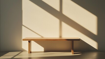 Poster - A minimalist wooden bench rests quietly against a wall illuminated by warm morning light. Long shadows stretch across the smooth surface, creating an artistic play of light and texture