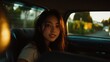 © DSN_1 - Smiling Young Asian Woman in a Vintage Car at Sunset