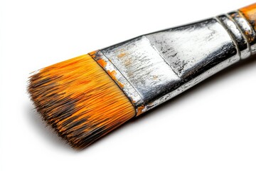 Poster - Close-up view of a used paintbrush with orange bristles on a white background showcasing artistic tools