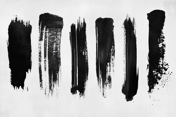Aufkleber - Black paint strokes on a white background showcasing varied textures and styles created by artistic brushes