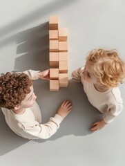 Fototapete - Scandinavian Minimalist Play Children Building with Wooden Blocks in Sunlit Space - Inspiring Early Childhood Development and Creative Learning Materials