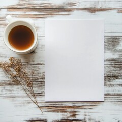 Leinwandbilder - Blank paper with a cup of tea and dried flowers on a rustic wooden table for creative inspiration and relaxation. Generative AI
