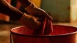 © ARBA - Wringing Out a Cloth with Gloved Hands in Soft Light