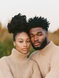 © Ryzhkov - Cozy Genderless Fashion Young Black Couple in Neutral Knit Sweaters for Inclusive Lifestyle and Sustainable Fashion Marketing