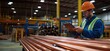 © k_viktar - Warehouse worker inspecting copper pipes using tablet in industrial setting, safety gear, organized inventory, modern manufacturing environment, copy space for text
