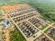 © AmazingAerialAgency - Aerial view of modern housing development with greenery and roads, Port Harcourt, Nigeria.