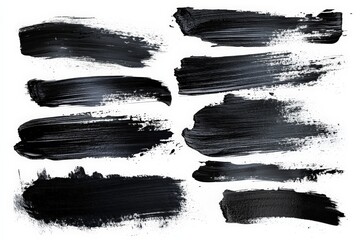 Poster - Multicolored black paint strokes arranged on a clean background for artistic projects and design inspiration